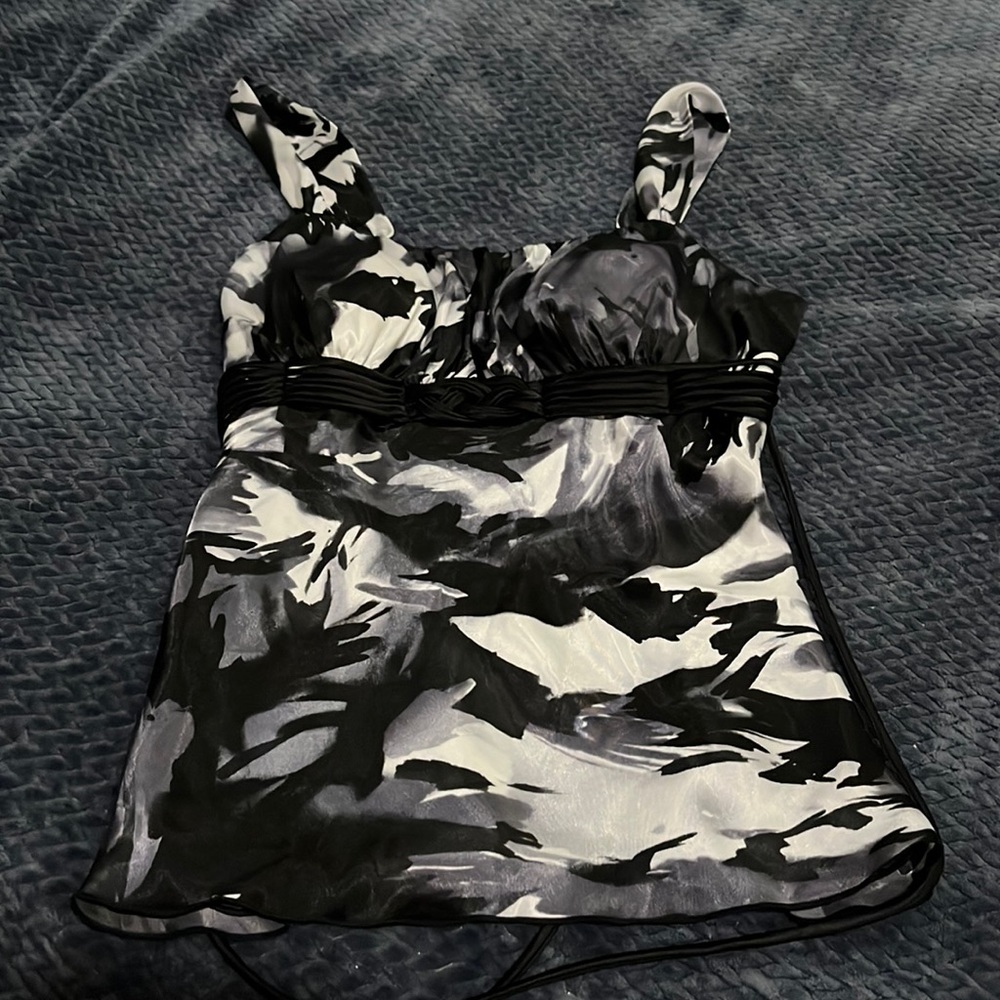 Really cute top for going out, built-in cups, and it ties around the back